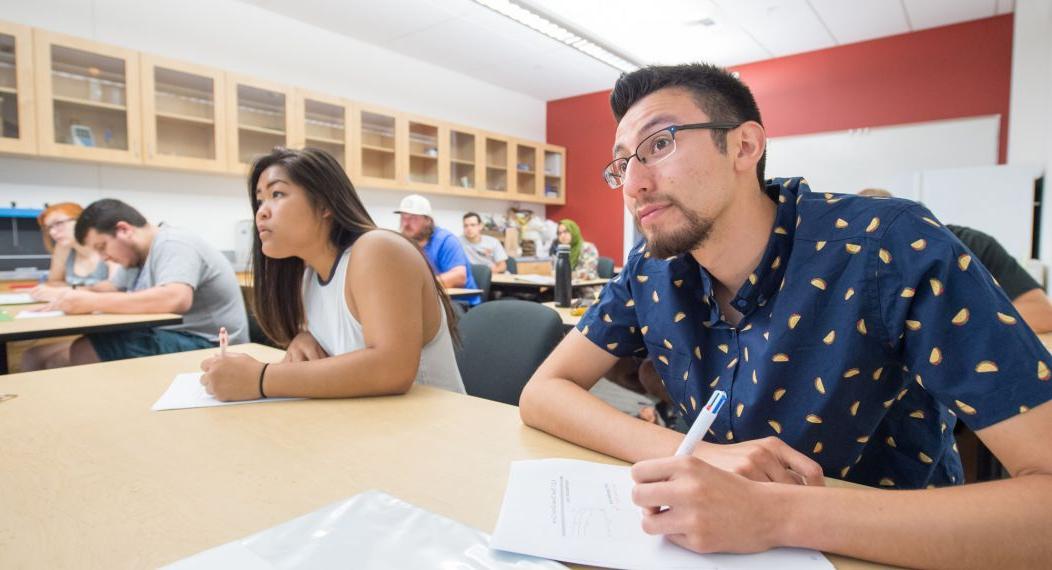 students take notes during class